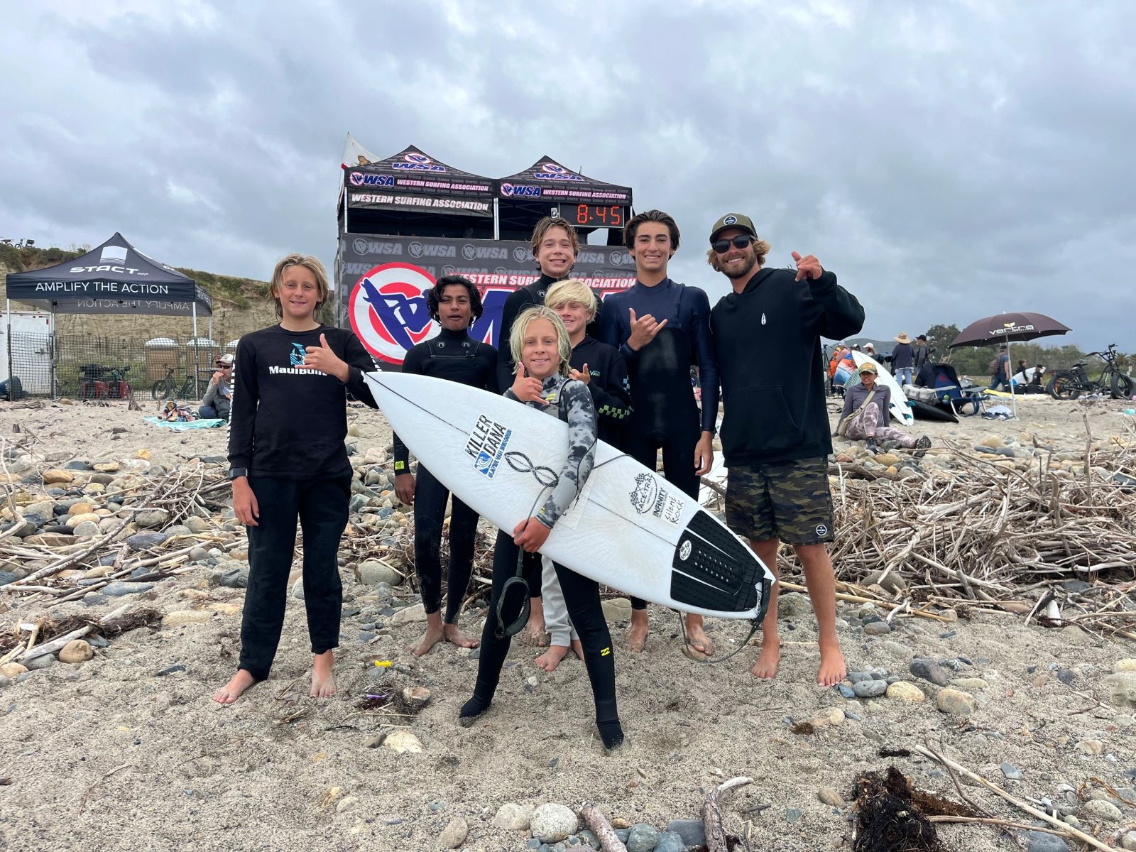 DP Surfcoach groms and their coach at a contest at Trestles